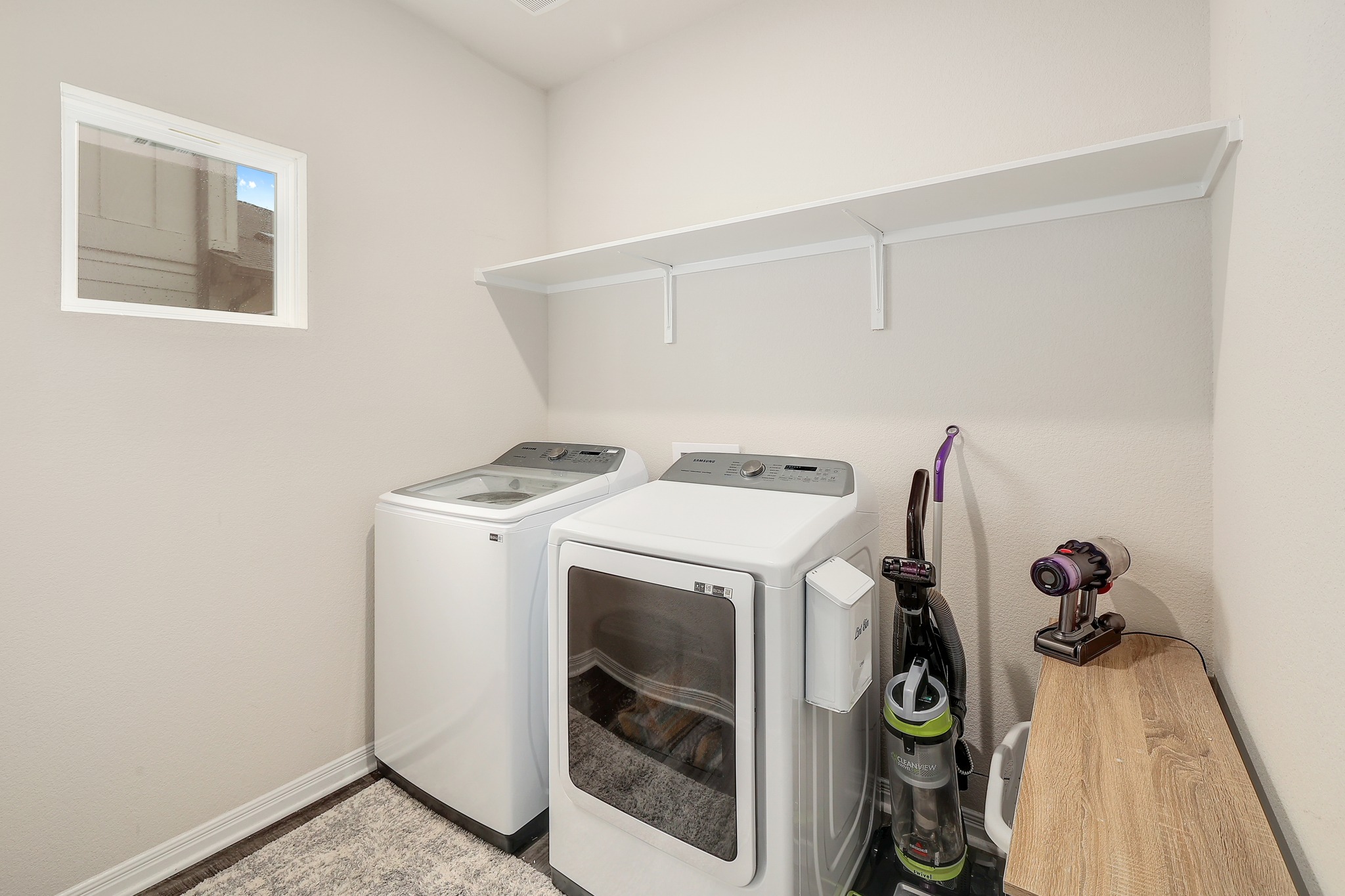 144 Sungrove Trail Georgetown, TX 78628 - Photo 26 of 40 The laundry area is located on the main floor.
