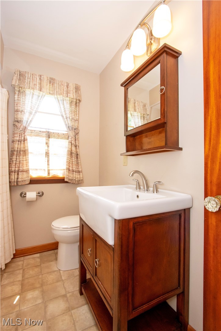 2456 Batdorf Road Wooster, OH 44691 - Photo 11 of 22 Full bathroom featuring vanity and toilet