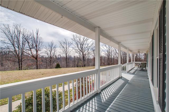 8694 Haselton Road Nashville, TN 37221 - Photo 2 of 19 Fabulous covered wrap porch perfect for watching the sunrises and sunsets!