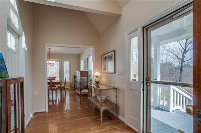 8694 Haselton Road Nashville, TN 37221 - Photo 3 of 19 Partial two story entry foyer with hardwood floors.