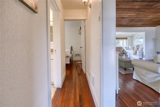 a view of a living room and bathroom