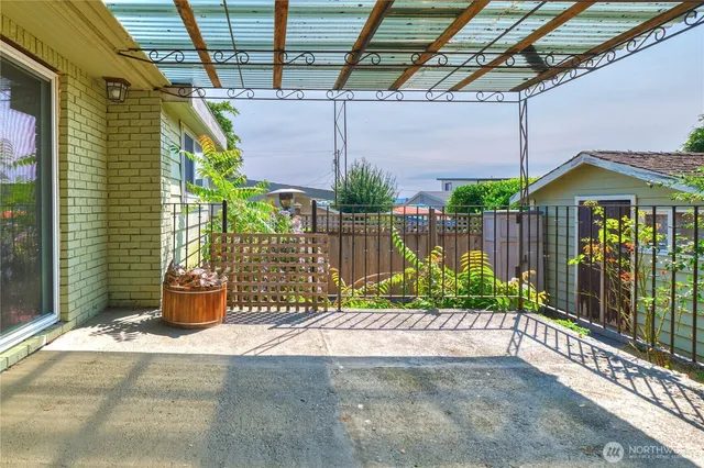 a view of a garden with a patio