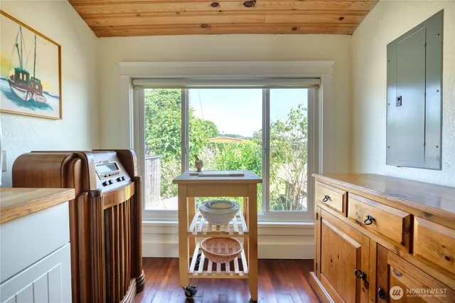 a view of an entryway with wooden floor