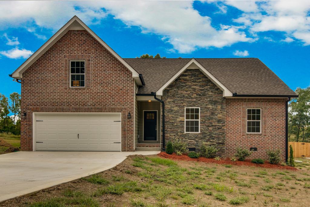 417 Kaiser Road Dickson, TN 37055 - Photo 1 of 30 a front view of a house with a yard