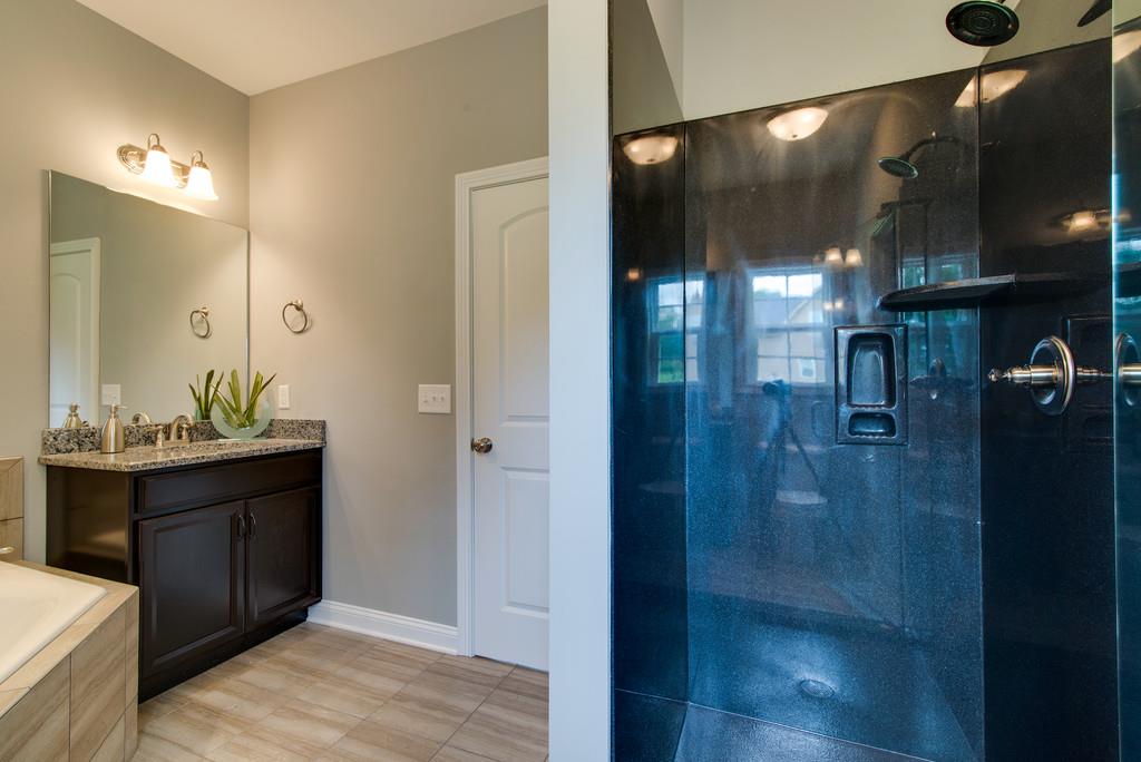 417 Kaiser Road Dickson, TN 37055 - Photo 15 of 30 a bathroom with a shower and a sink