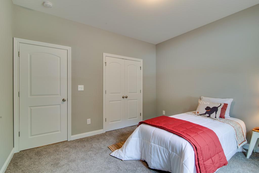 417 Kaiser Road Dickson, TN 37055 - Photo 25 of 30 a bedroom with a bed and a window