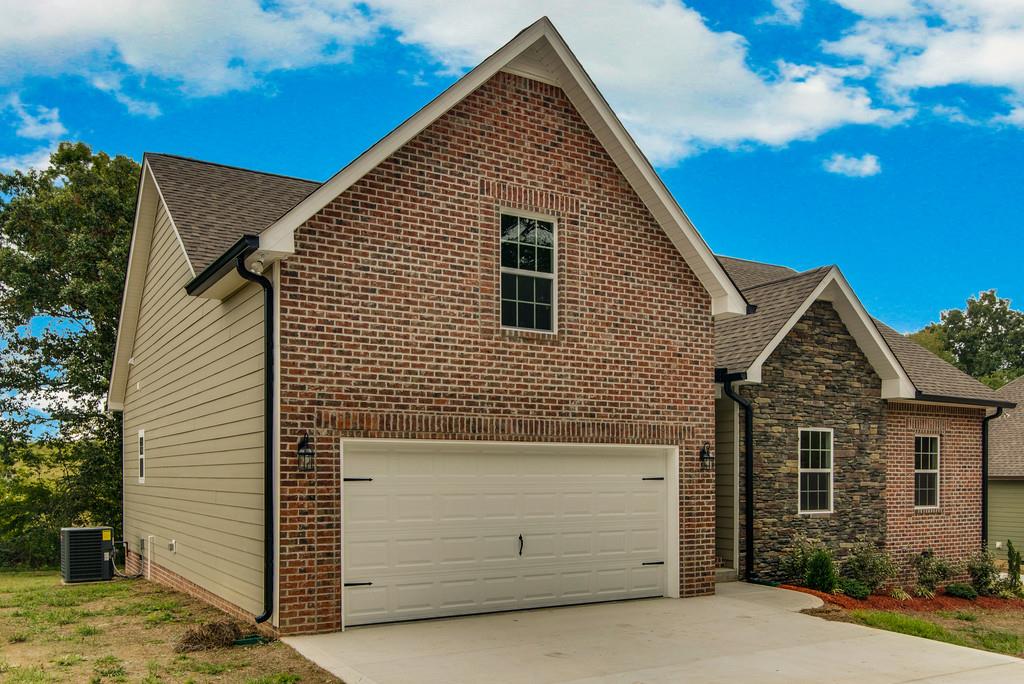417 Kaiser Road Dickson, TN 37055 - Photo 26 of 30 a front view of a house with a yard