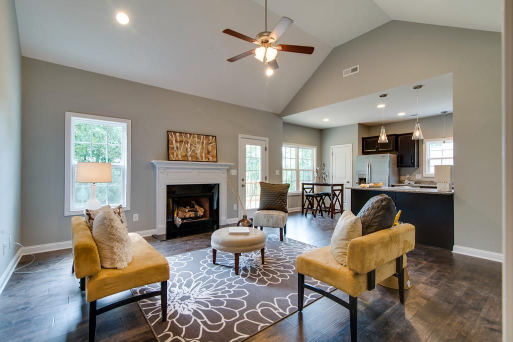 417 Kaiser Road Dickson, TN 37055 - Photo 3 of 30 a living room with furniture and a fireplace