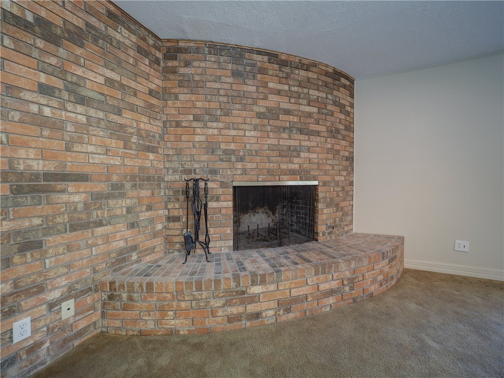 161 Sunset Ingleside, TX 78362 - Photo 14 of 35 a room with a fireplace