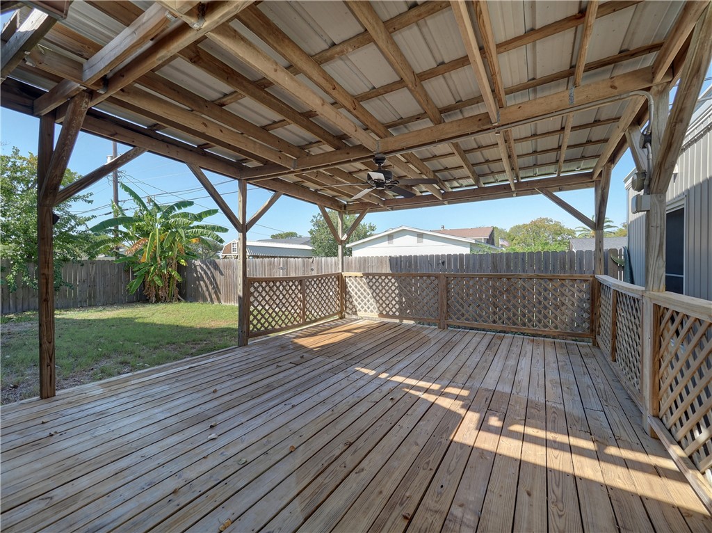 161 Sunset Ingleside, TX 78362 - Photo 22 of 35 a view of backyard with wooden floor