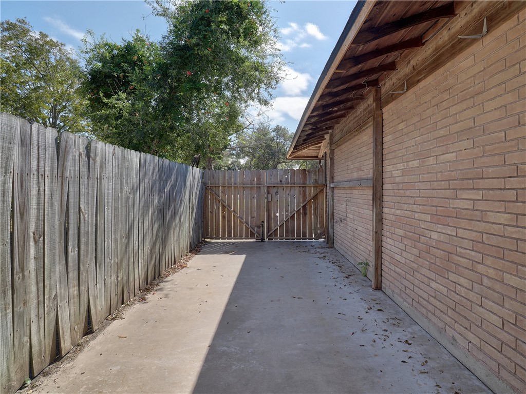 161 Sunset Ingleside, TX 78362 - Photo 27 of 35 a view of a wooden fence