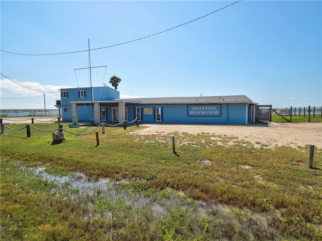 161 Sunset Ingleside, TX 78362 - Photo 28 of 35 a view of a house with a yard