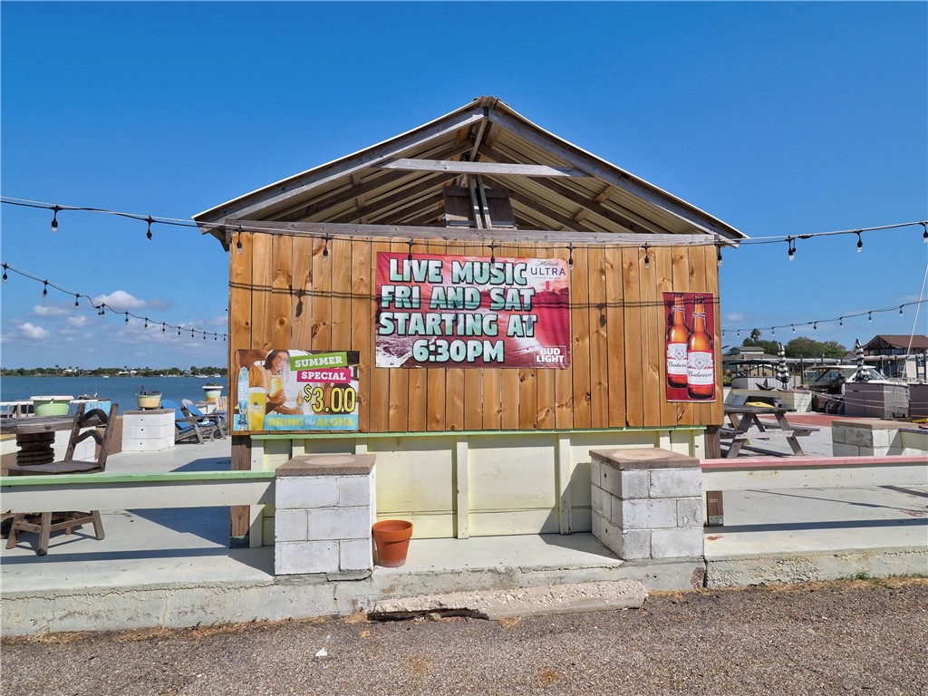 161 Sunset Ingleside, TX 78362 - Photo 31 of 35 a front view of a building with glass windows
