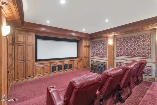 a bedroom with two beds and painted walls
