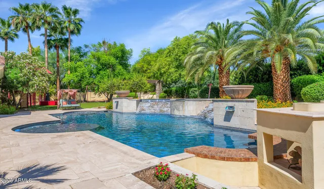 a view of a swimming pool with a patio