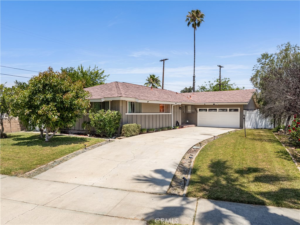 5065 Carlingford Avenue Riverside, CA 92504 - Photo 1 of 1 a front view of a house with a garden