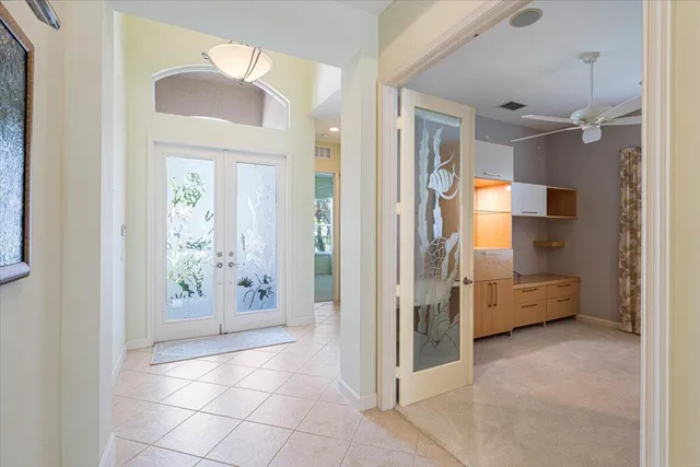 a dining room with furniture and a view of kitchen