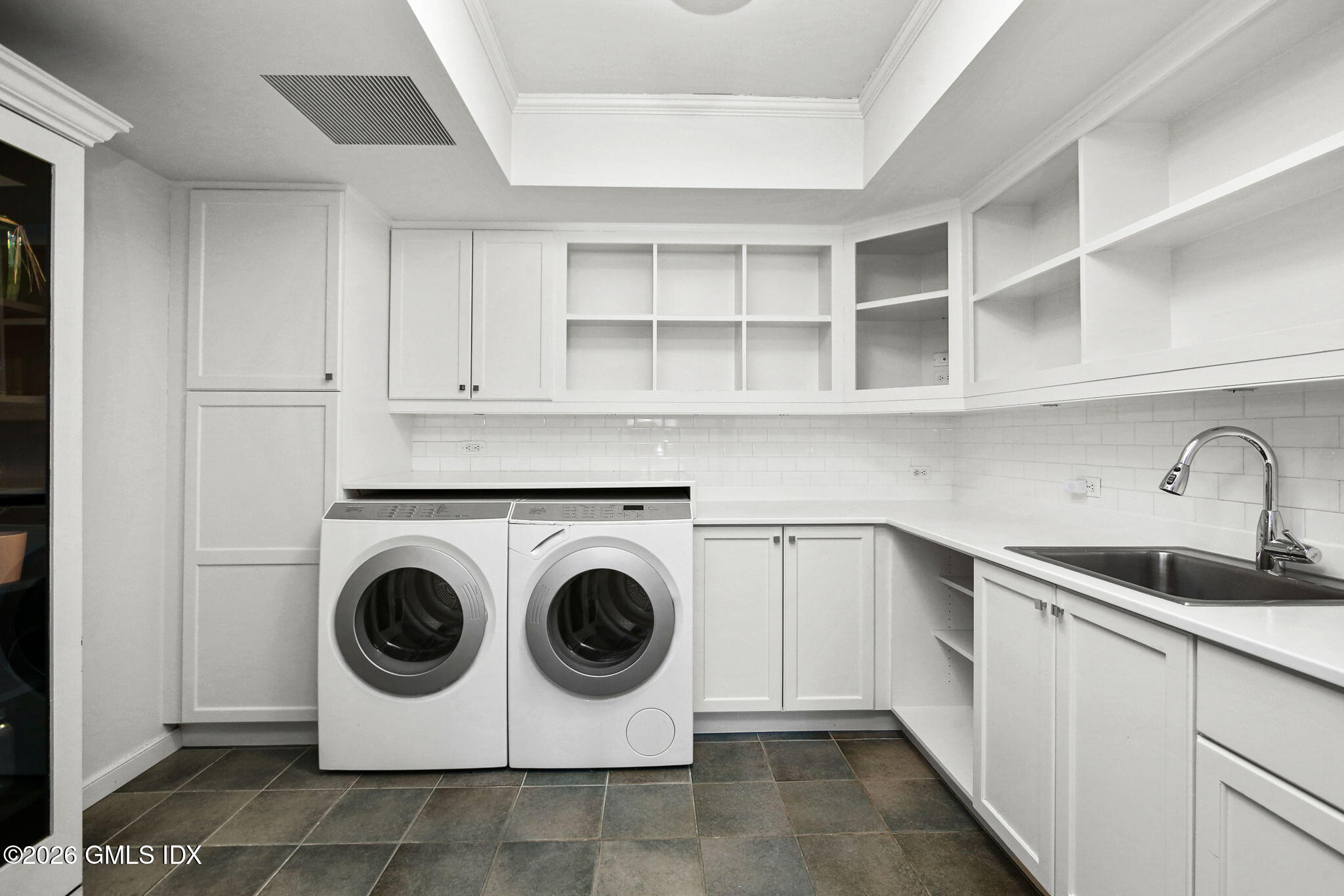 164 Round Hill Road Greenwich, CT 06831 - Photo 22 of 67 a utility room with sink dryer and washer