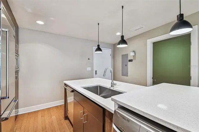 a kitchen with counter top space and a sink