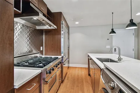 a room with gym equipment and windows