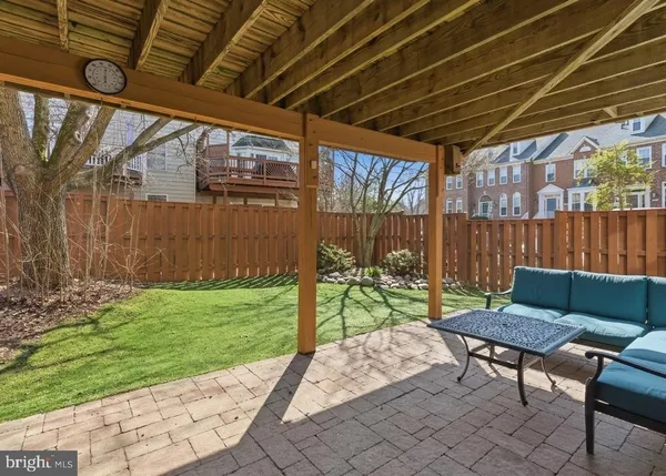a view of yard with outdoor seating