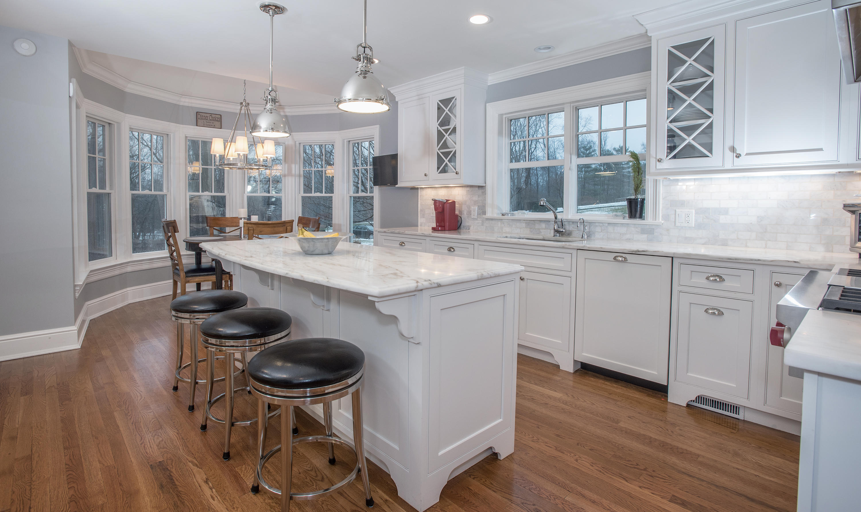 130 Skyview Lane New Canaan, CT 06840 - Photo 11 of 44 a kitchen with a table and chairs in it