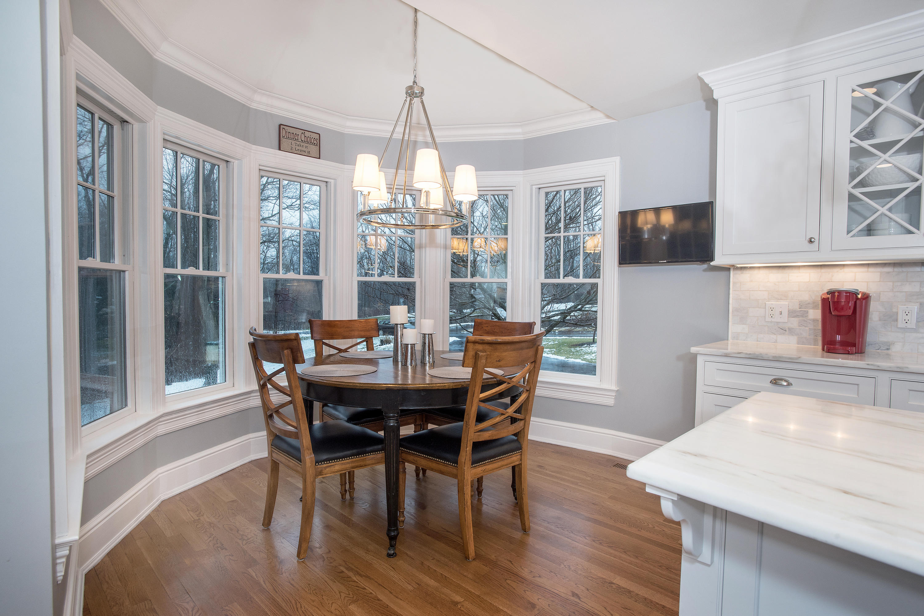 130 Skyview Lane New Canaan, CT 06840 - Photo 12 of 44 a view of a dining room with furniture and wooden floor