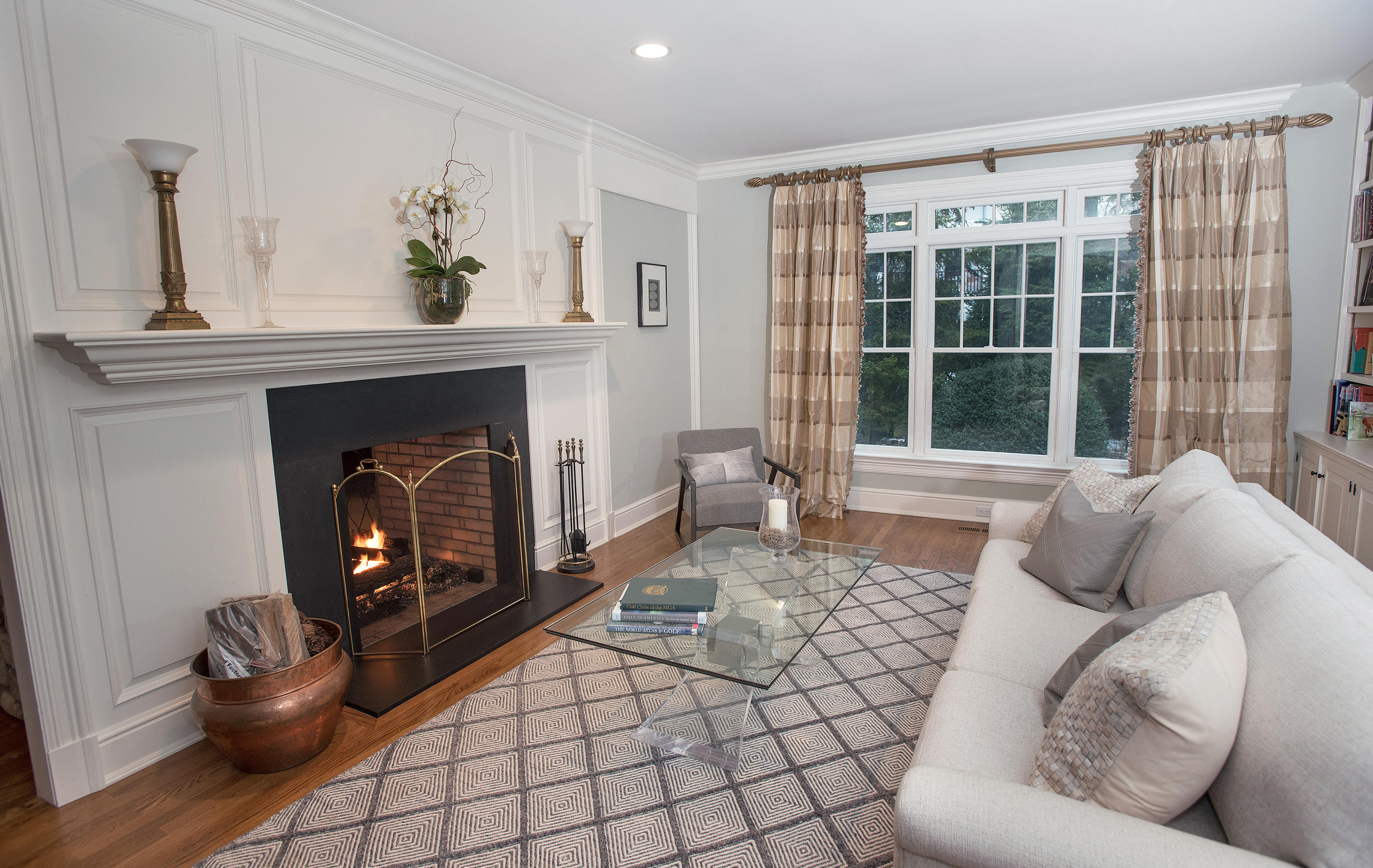 130 Skyview Lane New Canaan, CT 06840 - Photo 18 of 44 a living room with furniture and a fireplace