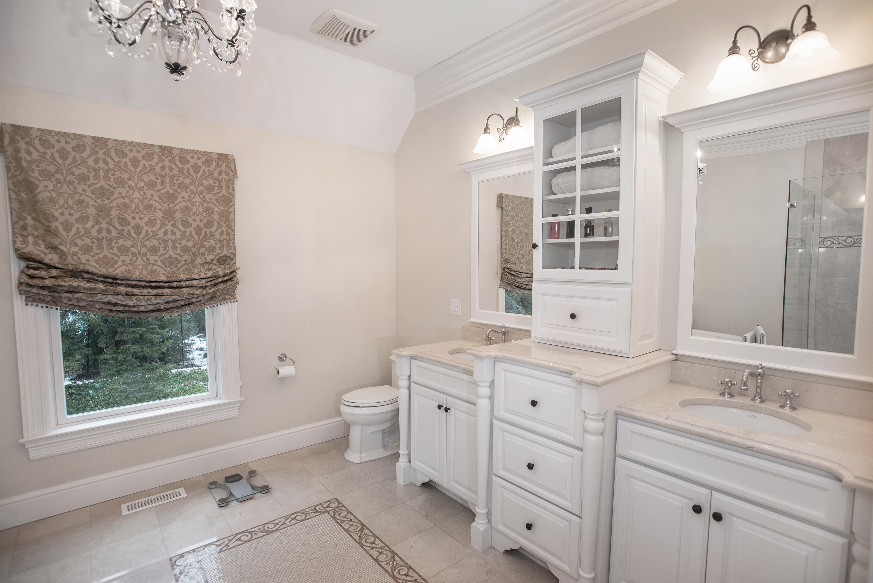 130 Skyview Lane New Canaan, CT 06840 - Photo 27 of 44 a bathroom with a granite countertop sink mirror vanity and a toilet