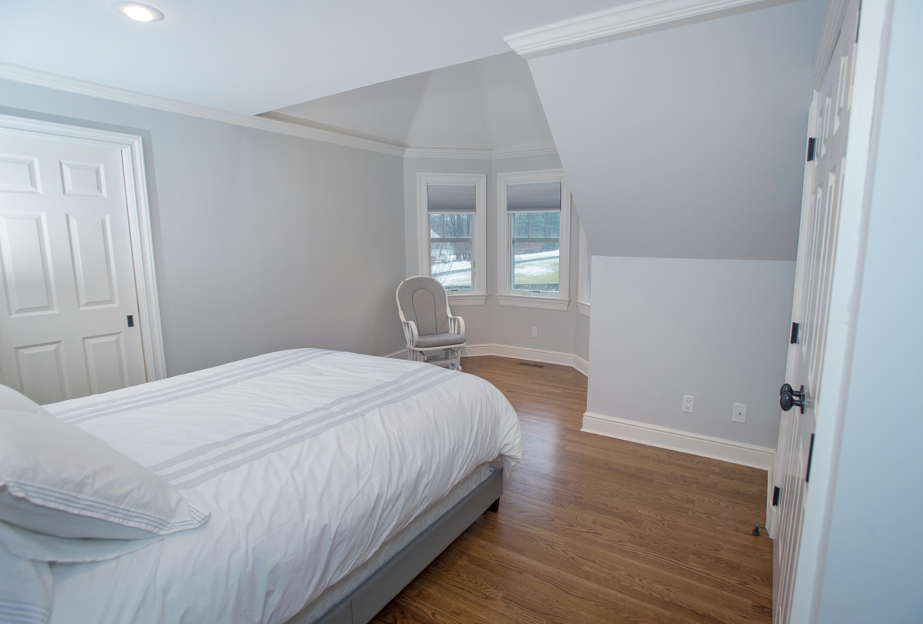 130 Skyview Lane New Canaan, CT 06840 - Photo 34 of 44 a bedroom with a bed and a window
