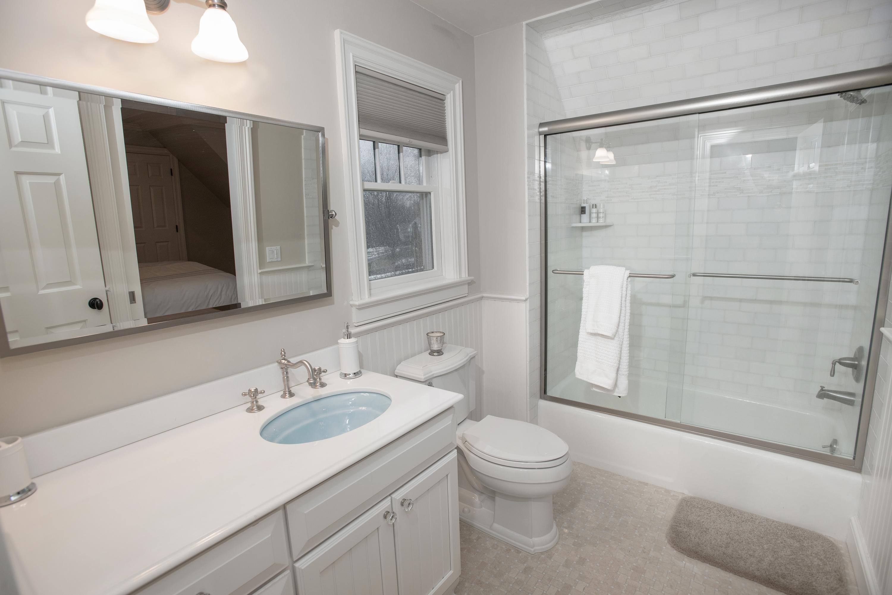 130 Skyview Lane New Canaan, CT 06840 - Photo 36 of 44 a bathroom with a sink toilet and shower