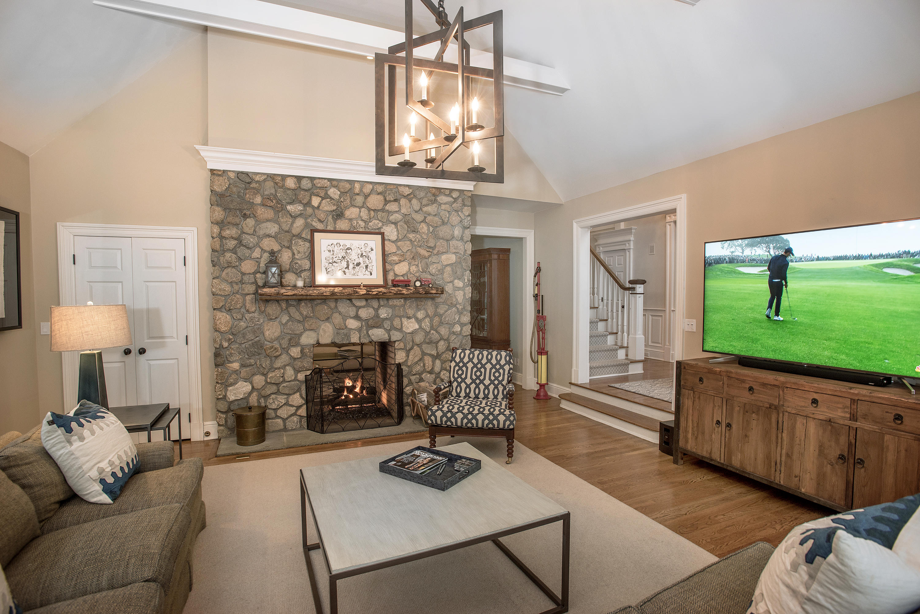 130 Skyview Lane New Canaan, CT 06840 - Photo 8 of 44 a living room with furniture and a fireplace