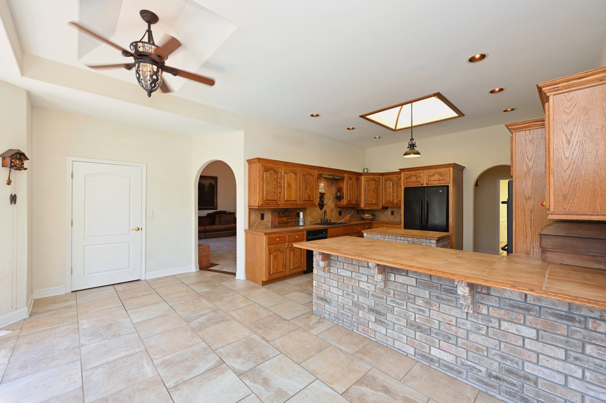 222 Ridgewater Way Mount Juliet, TN 37122 - Photo 12 of 41 a large kitchen with stainless steel appliances kitchen island granite countertop a stove and a sink with granite countertops