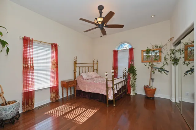 a bed room with a bed and a window