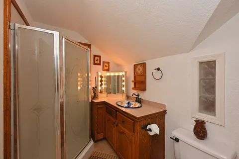 a utility room with cabinets washer and dryer
