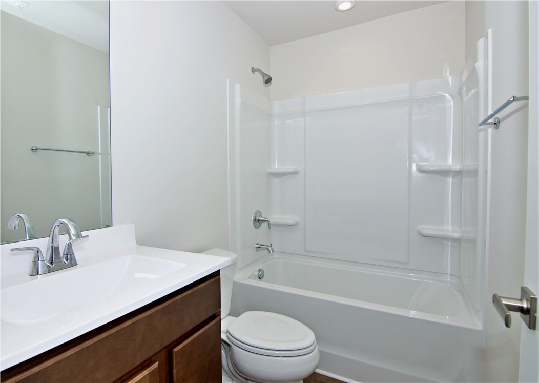 723 Peridot Way Westminster, SC 29693 - Photo 29 of 45 A well-appointed bathroom features a practical shower-over-tub combination and a clean, contemporary vanity.
