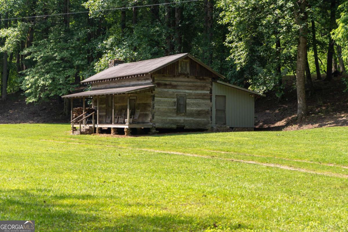 7320 Chestnut Valley Road Hiawassee, GA 30546 - Photo 53 of 91 a house view with swimming pool in front of it