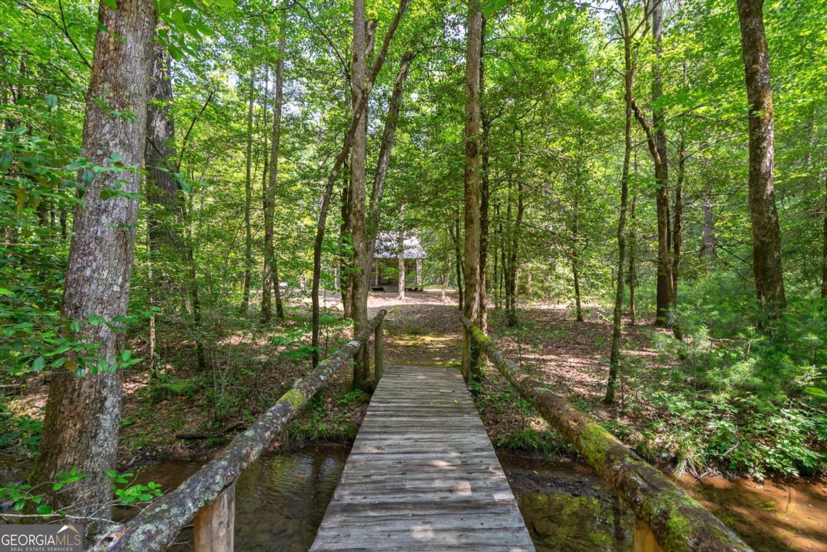 7320 Chestnut Valley Road Hiawassee, GA 30546 - Photo 83 of 91 a narrow alley leading to a building