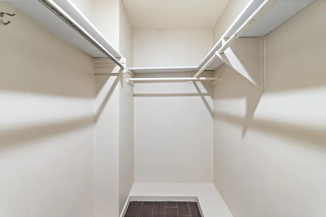 a view of an empty walk in closet