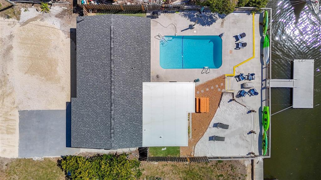 4984 Cedarbrook Lane Hernando Beach, FL 34607 - Photo 5 of 65 an aerial view of a house with a yard