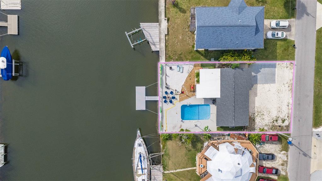 4984 Cedarbrook Lane Hernando Beach, FL 34607 - Photo 63 of 65 an aerial view of house with yard