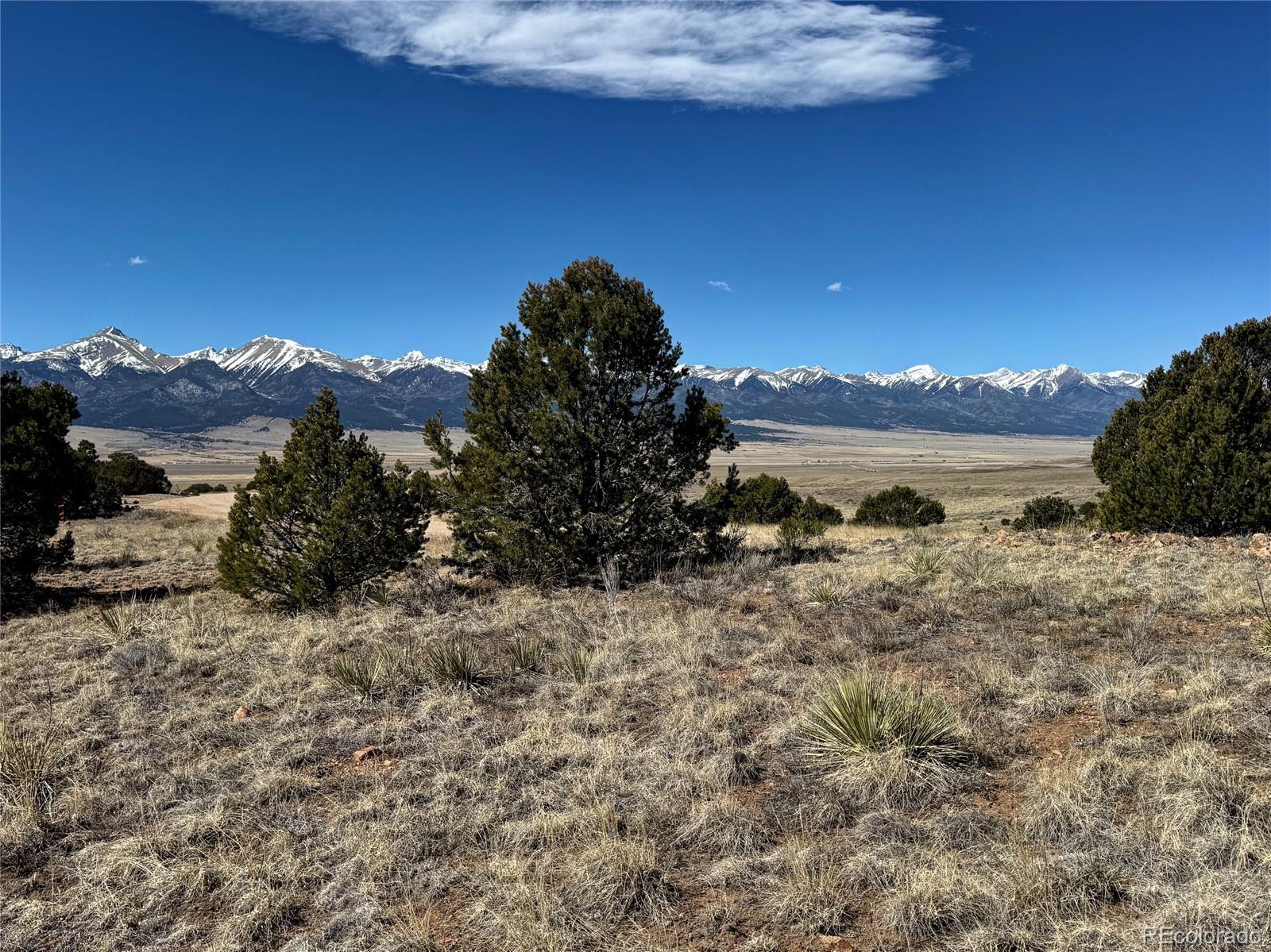514 Kiowa Road Westcliffe, CO 81252 - Photo 9 of 27 a view of a lake with a mountain in the background