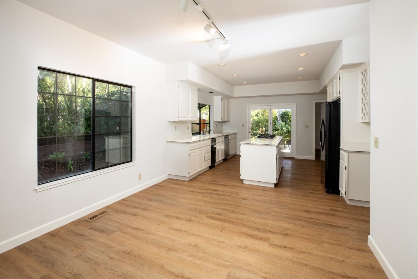 11 Fairway Place Half Moon Bay, CA 94019 - Photo 21 of 42 a view of a kitchen with a sink a refrigerator and window