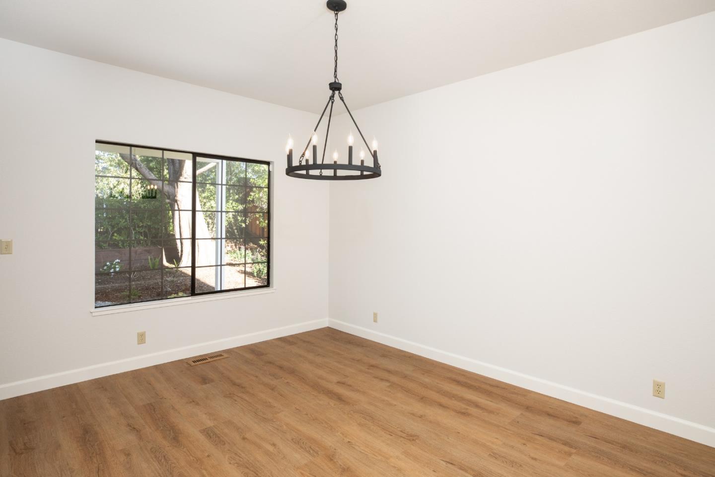 11 Fairway Place Half Moon Bay, CA 94019 - Photo 25 of 42 a view of a room with wooden floor and windows