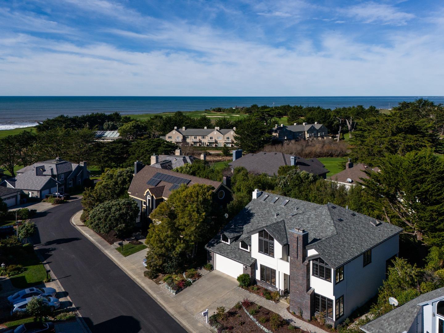 11 Fairway Place Half Moon Bay, CA 94019 - Photo 3 of 42 an aerial view of multiple houses with a yard