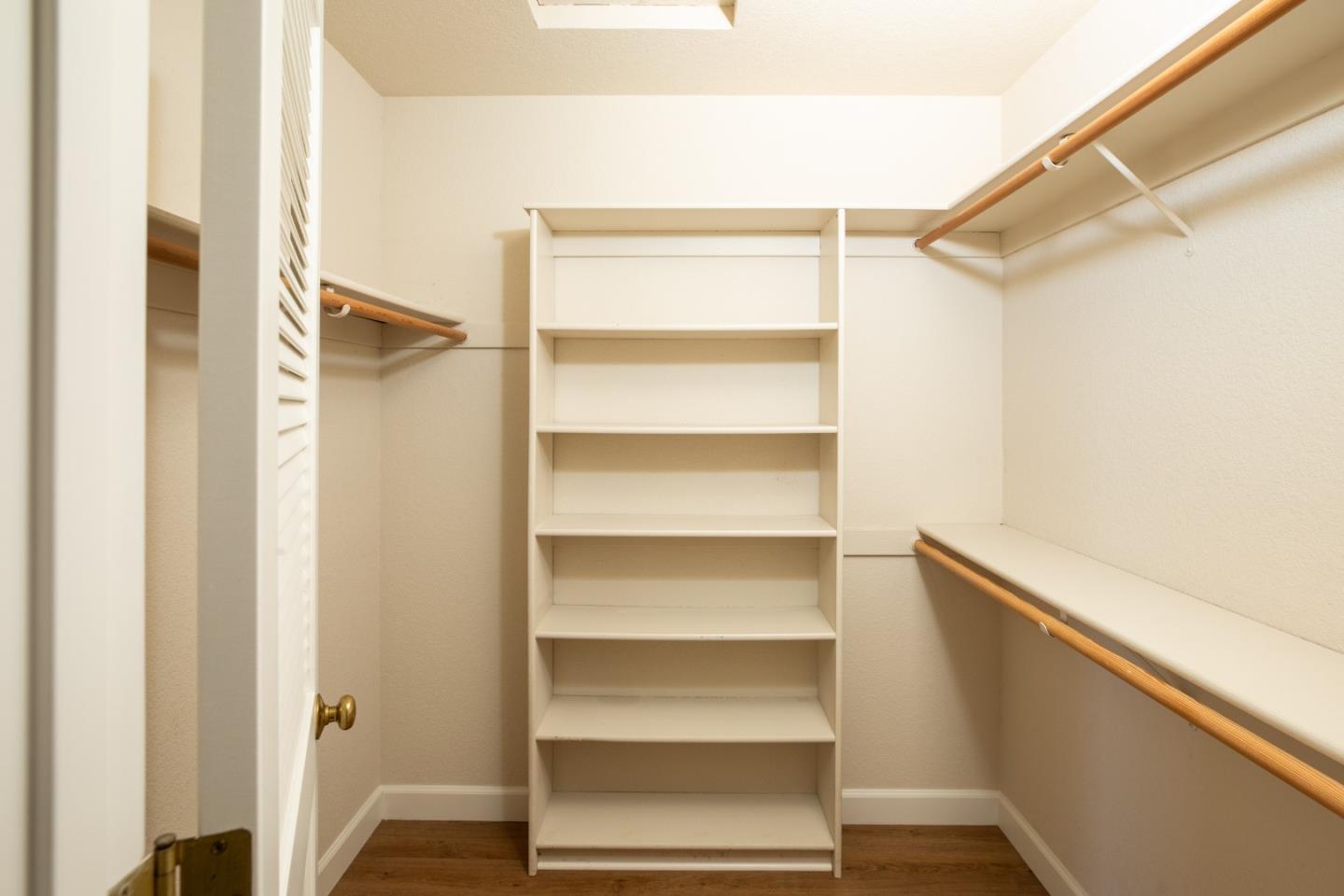 11 Fairway Place Half Moon Bay, CA 94019 - Photo 33 of 42 a view of walk in closet with empty racks