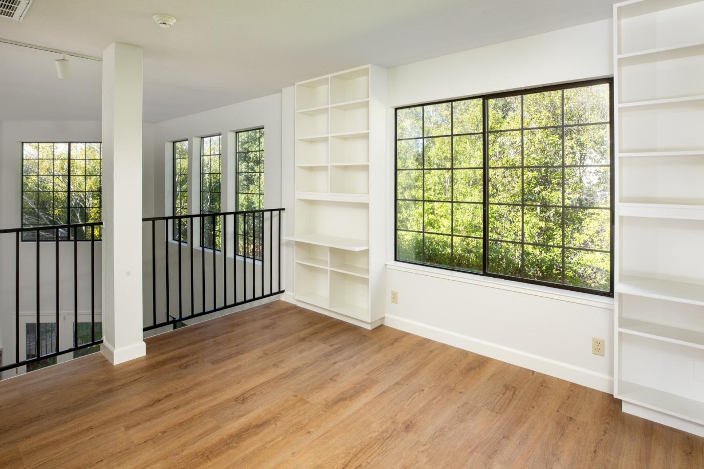 11 Fairway Place Half Moon Bay, CA 94019 - Photo 35 of 42 a view of a room with wooden floor and windows