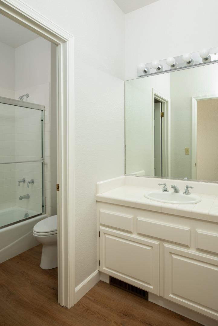 11 Fairway Place Half Moon Bay, CA 94019 - Photo 40 of 42 a bathroom with a sink and a mirror