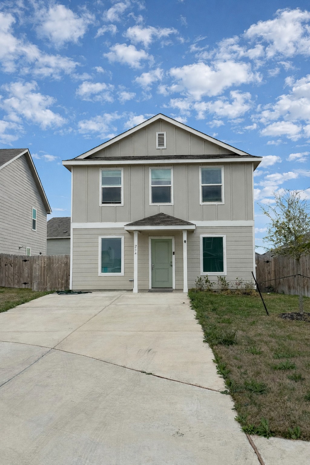23408 Tiny Moons Way Elgin, TX 78621 - Photo 1 of 11 a front view of a house with a yard