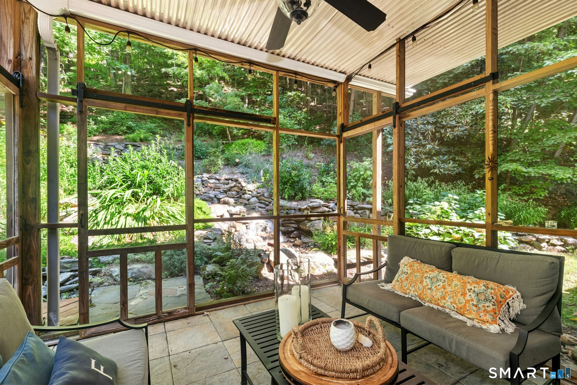 9 Teachers Ridge Road Newtown, CT 06482 - Photo 33 of 35 Enjoy delightful waterfall from screened porch